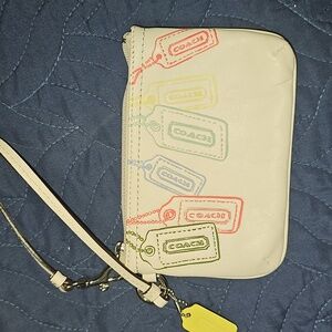 Coach Cream Wristlet with Multicolor Tag Design NWOT Excellent Condition Clean